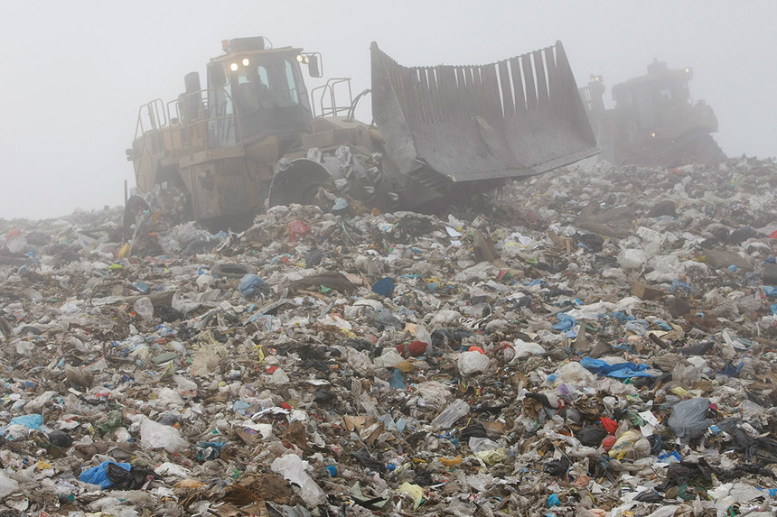 A tractor sorts garbage at the Altamont Landfill in Livermore, Calif., in 2009
