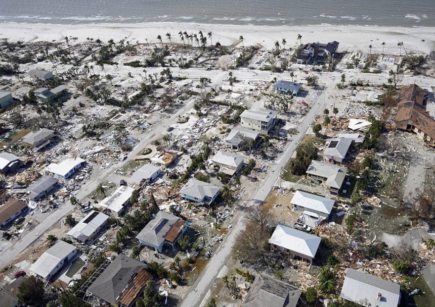 Debris surrounds damaged homes in the aftermath of Hurricane Ian in Fort Myers Beach, Fla., in September.